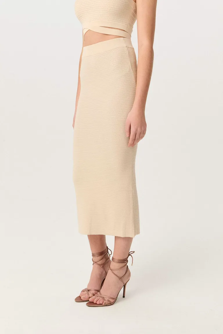 Falda midi de punto tramado con silueta anatómica y calce perfecto de Markova en Faldas para argentina