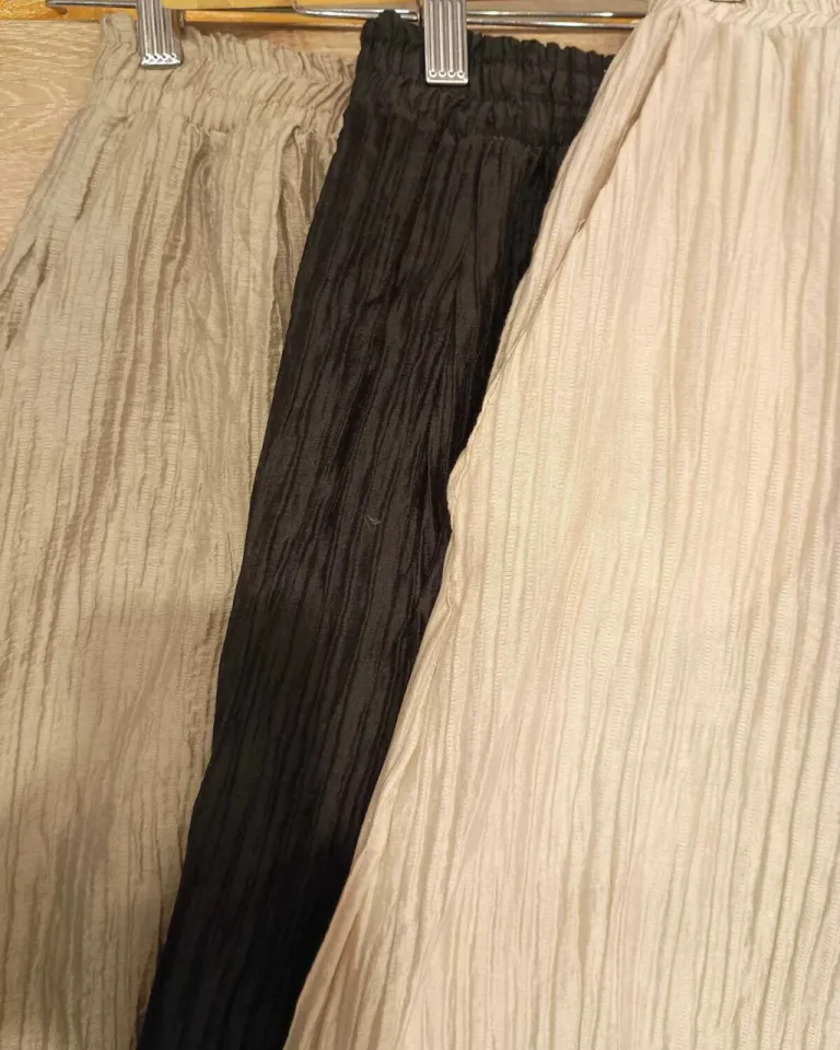 Falda plisada tableada con elástico en la cintura y bolsillos laterales de Belle en Faldas para argentina