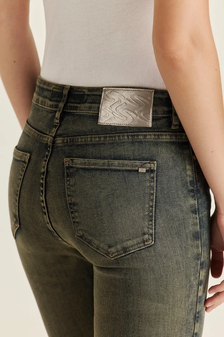 Pantalón de denim tiro alto con acabado especial y desgaste vintage de Tucci en Pantalones para argentina