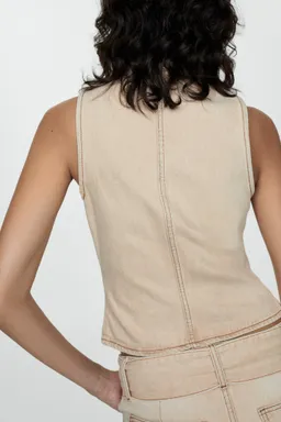 Top denim con cremallera de Mango en Tops para argentina