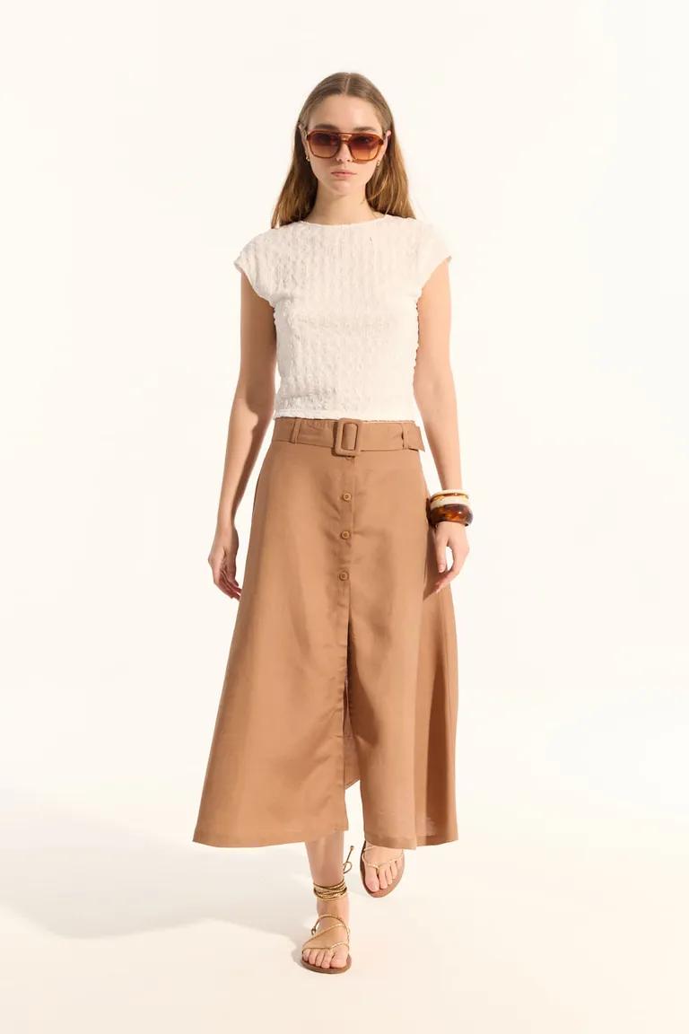 Top de mangas cortas y escote redondo en tela con textura para mujer de Portsaid en Tops para argentina