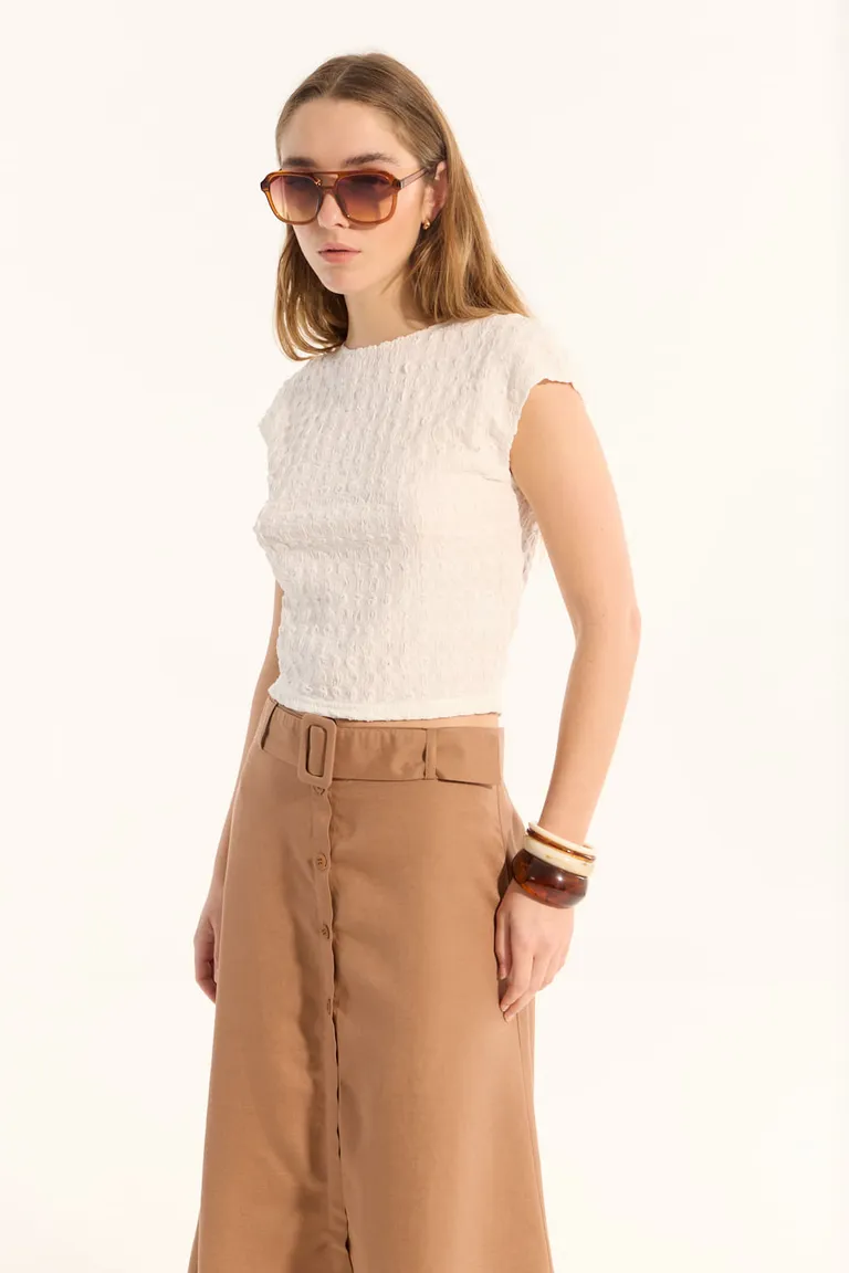 Top de mangas cortas y escote redondo en tela con textura para mujer de Portsaid en Tops para argentina