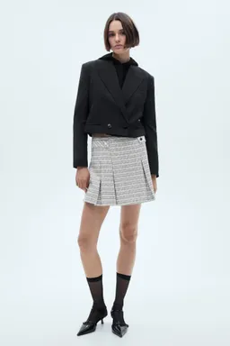 Minifalda tweed con botones de Mango en Faldas para argentina