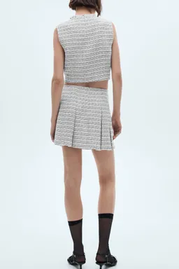 Minifalda tweed con botones de Mango en Faldas para argentina