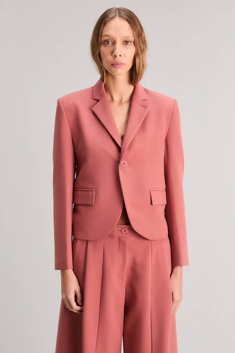 Blazer rosa de calce slim, corte clásico y diseño versátil de Kosiuko en Blazers para argentina