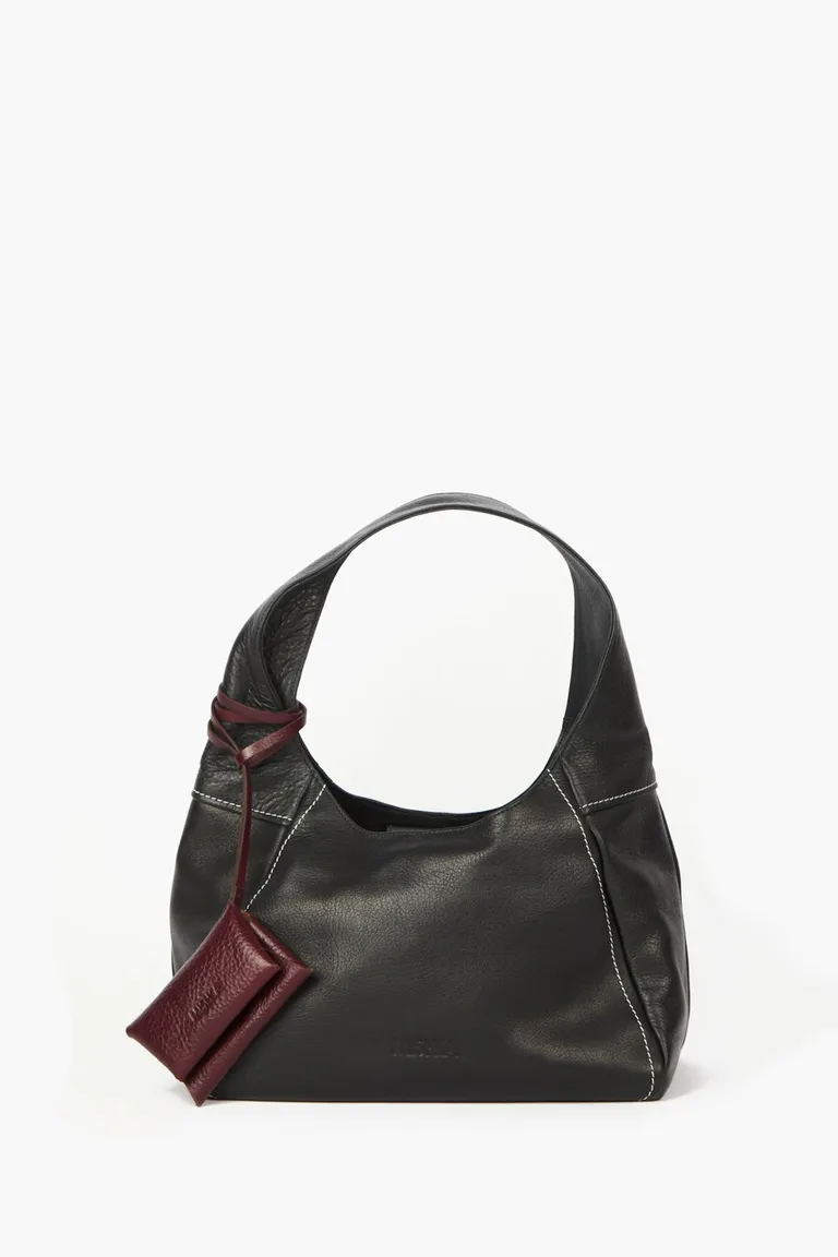 Cartera amplia de mano con detalle colgante desmontable y costuras visibles de Mishka en Bolsos y Carteras para argentina