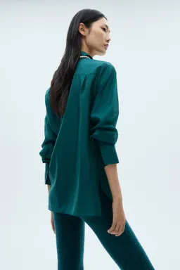 Camisa satinada con botones ocultos de Mango en Camisas para argentina