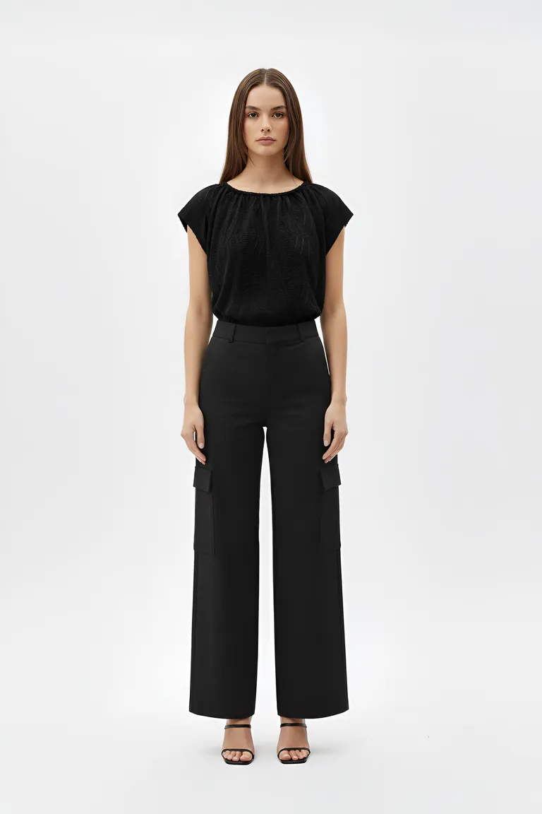 Top negro sin mangas con corte holgado y estilo elegante de Naíma en Tops para argentina