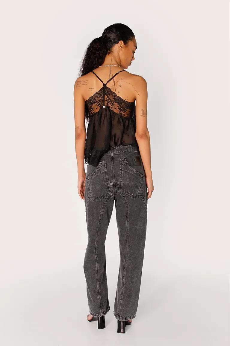 Pantalón de denim negro con diseño de recortes curvos y costuras destacadas de Sofia Sarkany en Pantalones para argentina