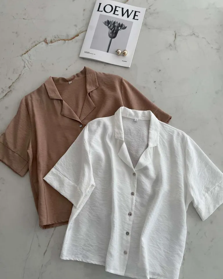 Camisa de seda blanca con solapa, diseño moderno y sofisticado para mujer de Hesed en Camisas para argentina