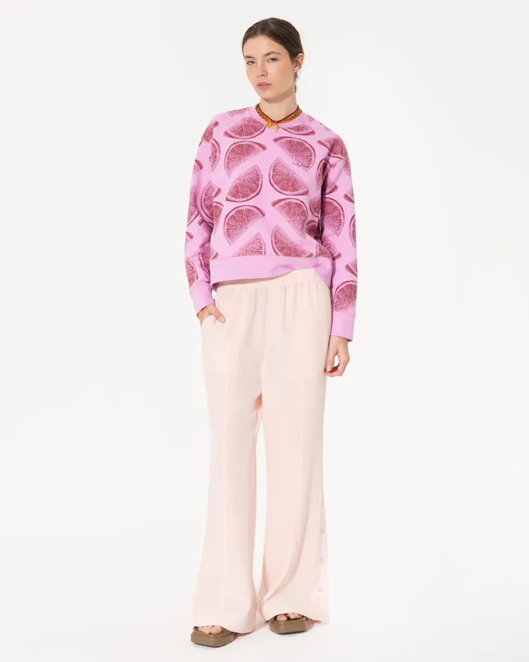 Buzo de verano rosado con llamativo estampado de diseño único de Jazmin Chebar en Buzos y Sweaters para argentina