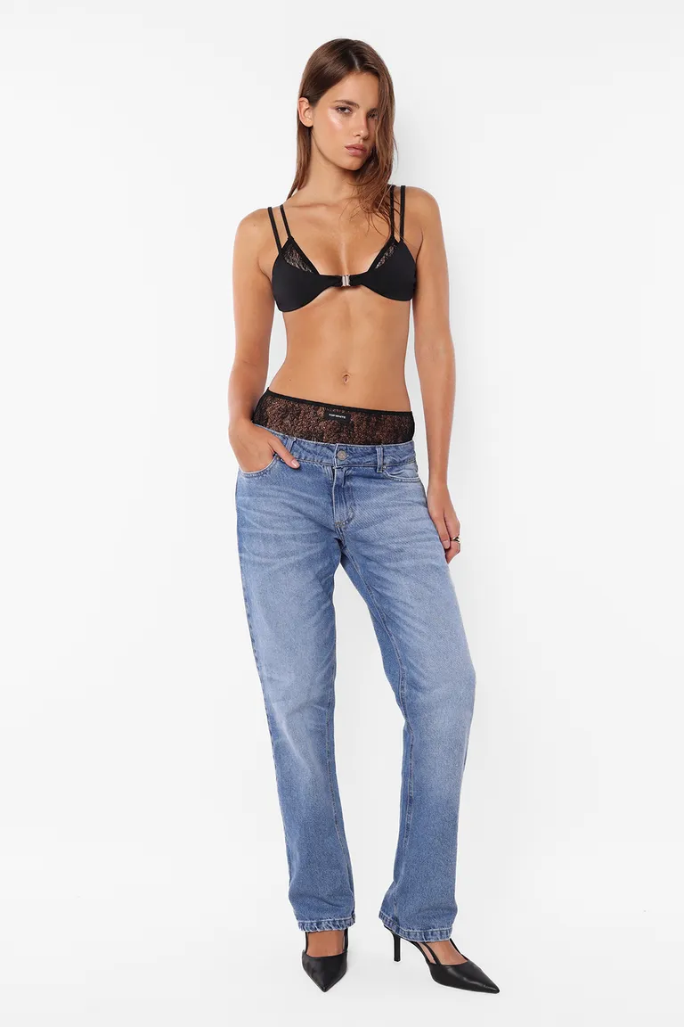 Pantalón denim de tiro bajo y pierna angosta con detalles artesanales de Top White en Pantalones para argentina