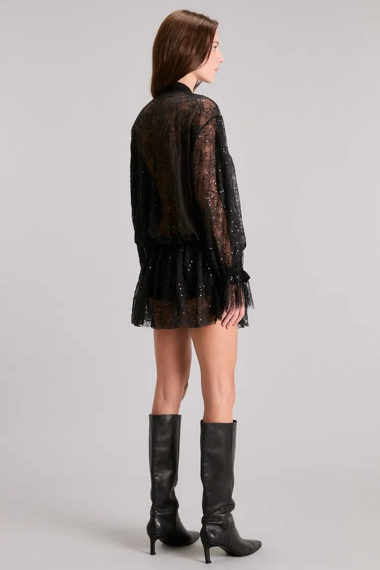 Vestido de encaje negro con detalles brillantes y mangas largas de Kosiuko en Vestidos para argentina