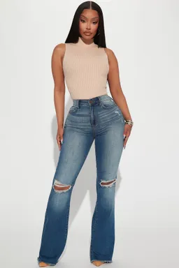 Jeans flare rotos richie de Fashion Nova en Pantalones para argentina