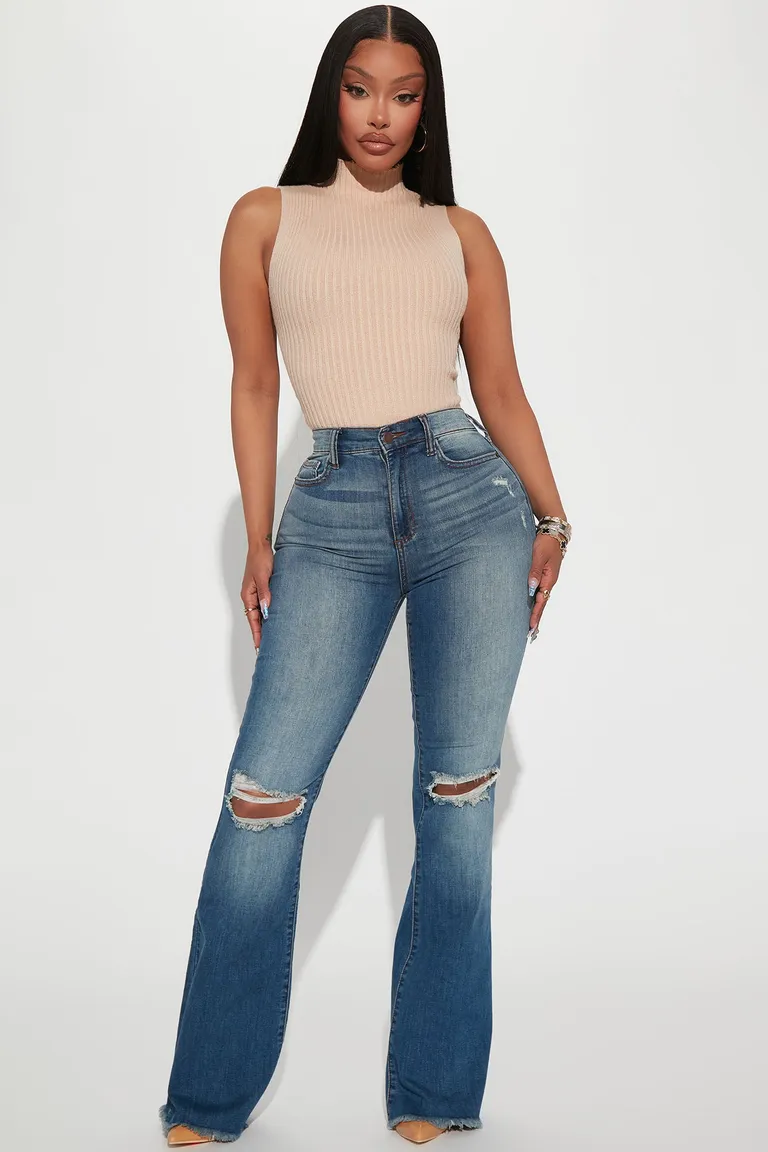 Jeans flare rotos richie de Fashion Nova en Pantalones para argentina