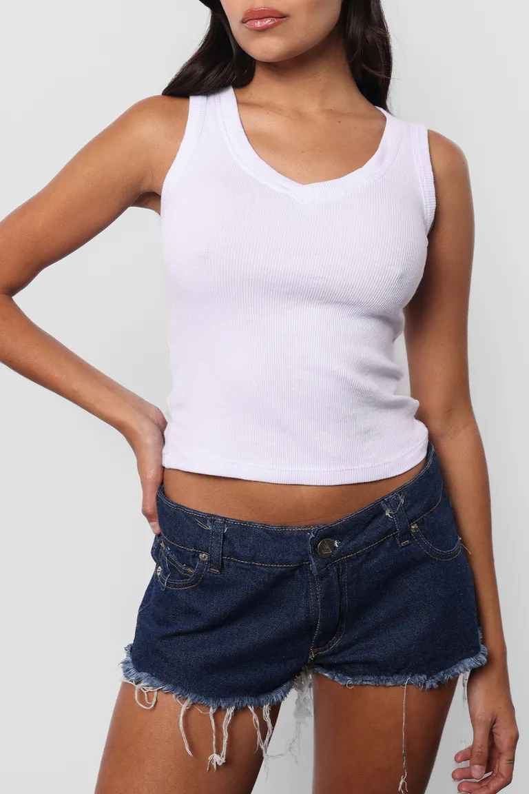 Shorts de jean micro con lavado artesanal y detalles de desflecado de Top White en Shorts para argentina