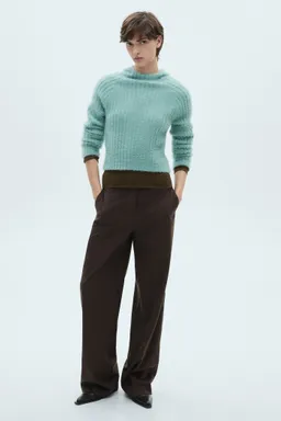 Sweater con capucha peludito de Mango en Buzos y Sweaters para argentina