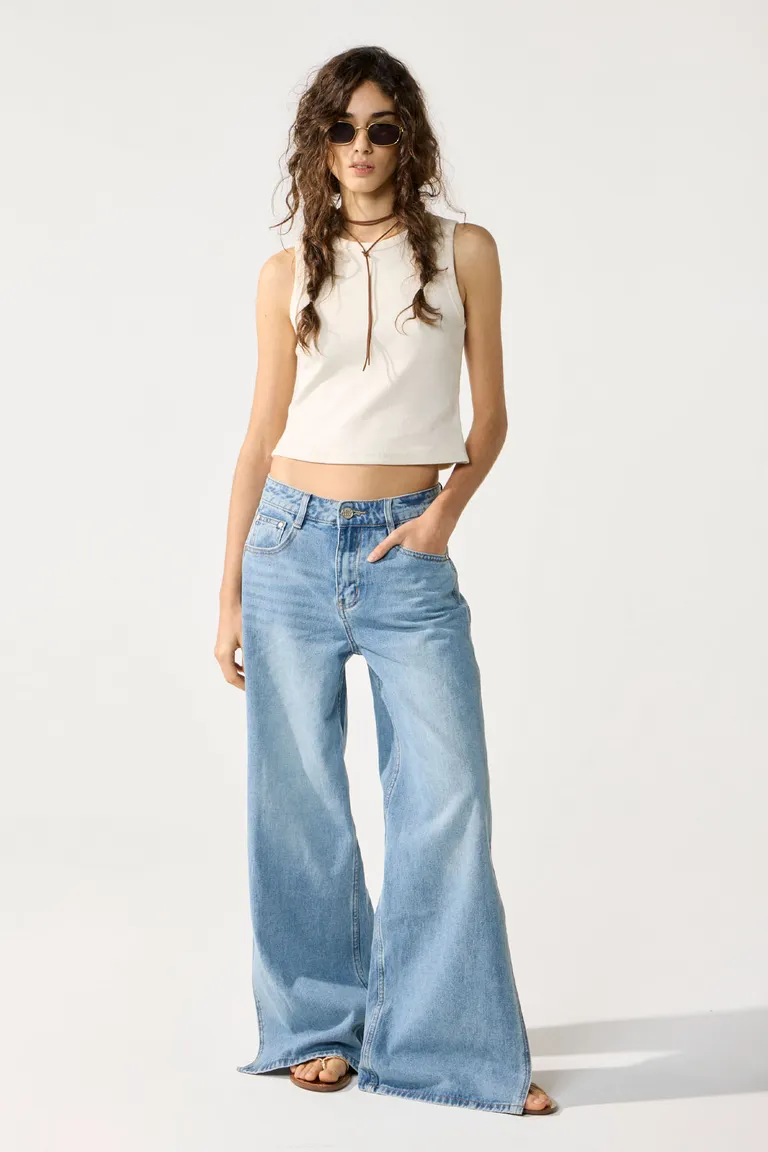 Pantalón de denim wide slit con lavado intenso y roturas en rodillas de Cuesta Blanca en Pantalones para argentina