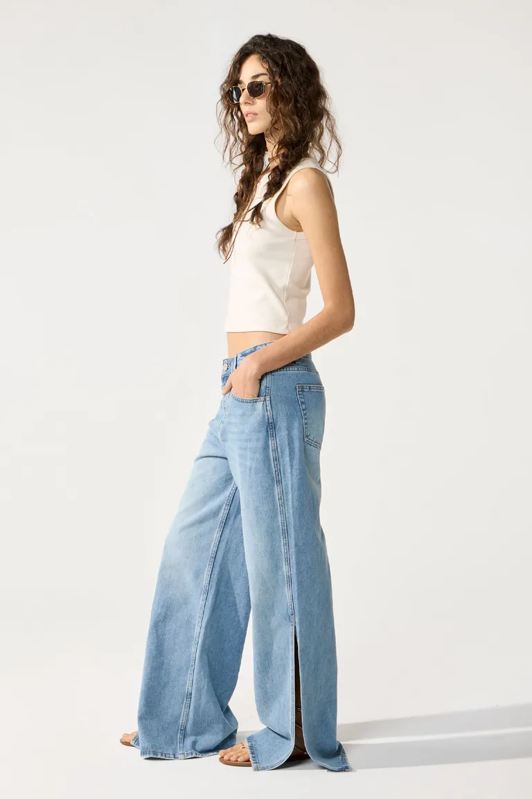 Pantalón de denim wide slit con lavado intenso y roturas en rodillas de Cuesta Blanca en Pantalones para argentina