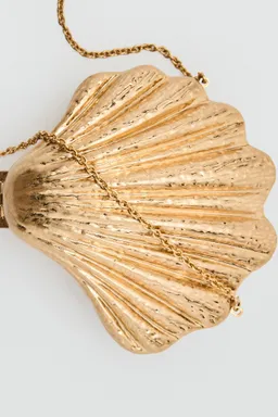 Clutch diseño concha de Mango en Bolsos y Carteras para argentina