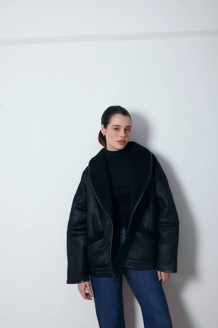 Gamulan delfina negro de Audaz en Chaquetas para argentina