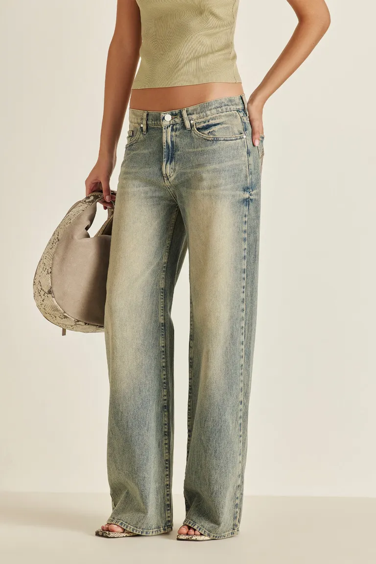 Pantalón de denim ancho y tiro bajo con detalles en oro de Tucci en Pantalones para argentina