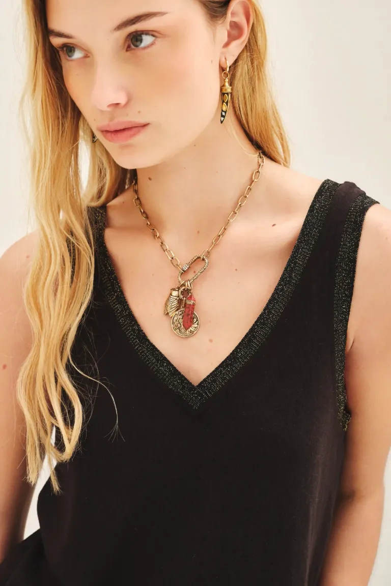 Top de punto negro con detalles brillantes en rib de Rapsodia en Remeras para argentina