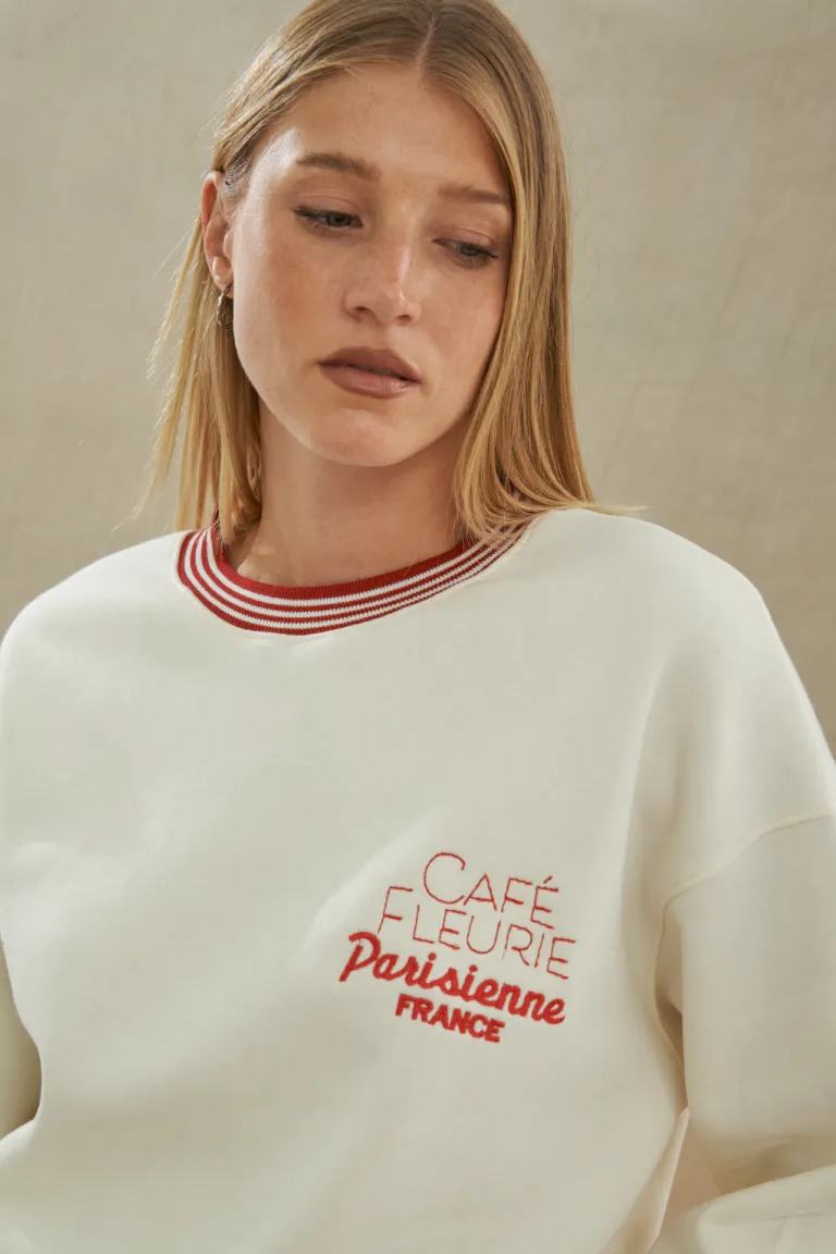 Buzo parisienne blanco con detalles en rayas rojas y azules de Apricot en Buzos y Sweaters para argentina