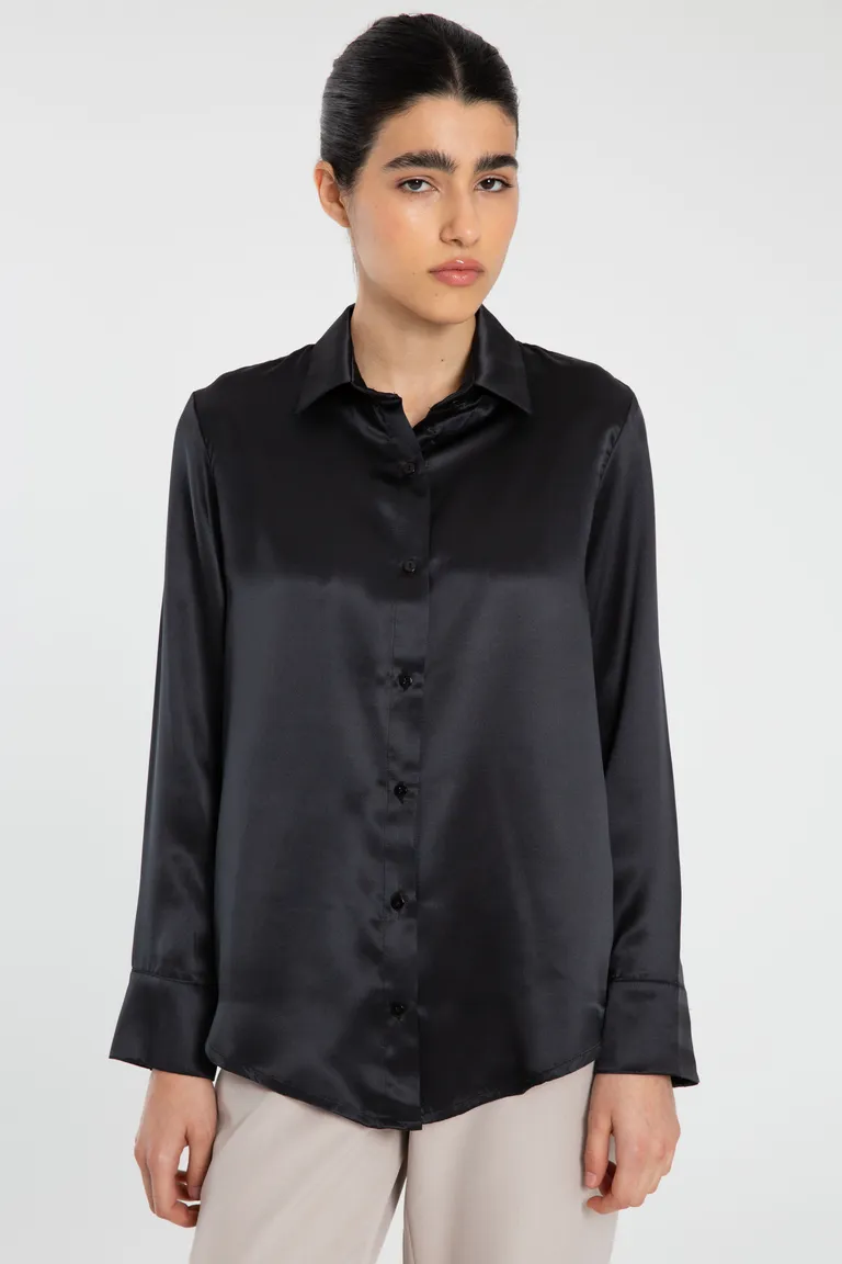 Camisa de seda negra con detalles de botones y puños con cartera de Naíma en Camisas para argentina