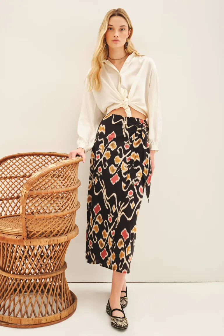 Falda midi estampada con lazos en la cintura, ideal para diferentes ocasiones de Rapsodia en Faldas para argentina