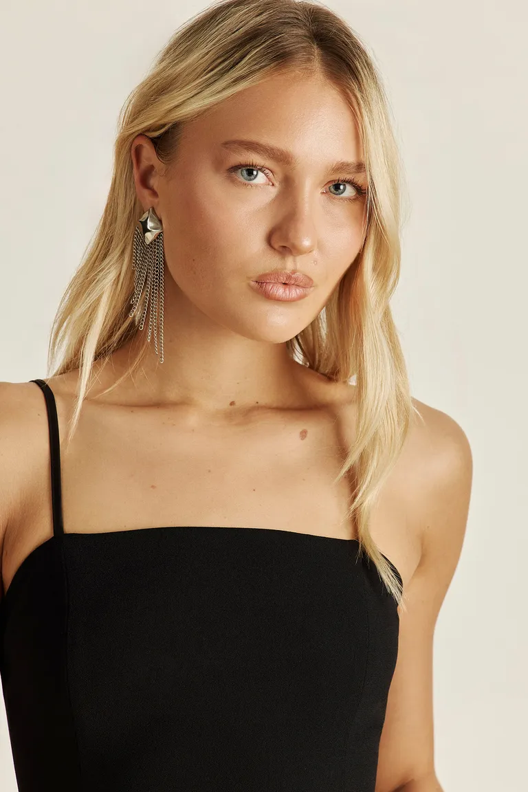 Top de crepé negro con detalles de punto smock en la espalda de Tucci en Tops para argentina