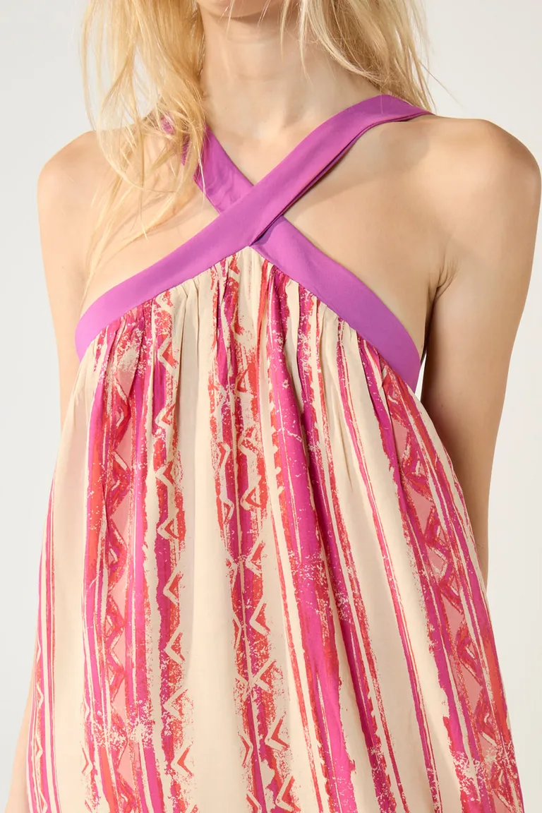 Vestido estampado rosa con escote haler y tiras en liso de Cuesta Blanca en Vestidos para argentina