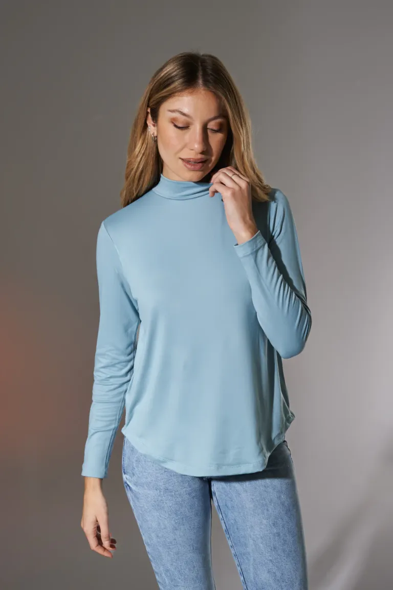 Remera de mangas largas de corte moderno y tonos suaves para un estilo femenino y refinado de Apricot en Remeras para argentina