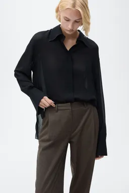 Pantalón wideleg abotonado de Mango en Pantalones para argentina