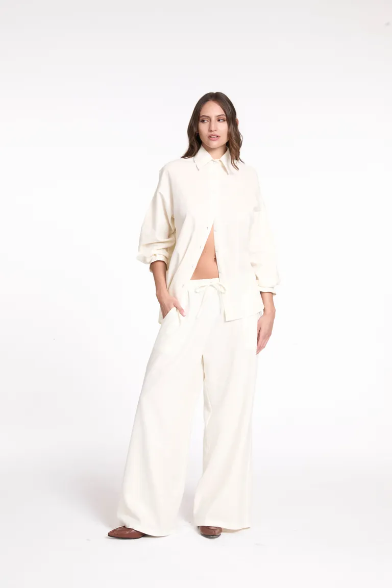 Pantalón de lino blanco con elástico en la cintura y bolsillos delanteros de Justaosadia en Pantalones para argentina