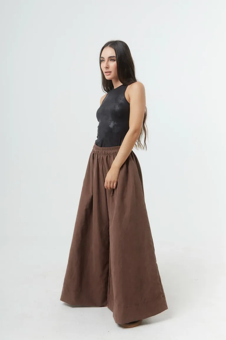 Body de lycra negro sin mangas, pieza versátil para estilizar la silueta de Belle en Bodies para argentina