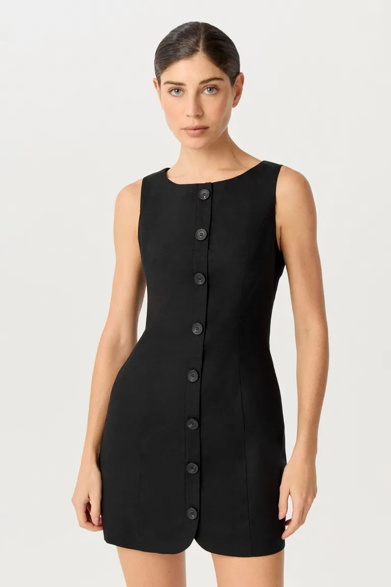 Vestido corto de silueta entallada y escote a la base, con acceso con botones veteados e interior forrado en satén elástico de Markova en Vestidos para argentina