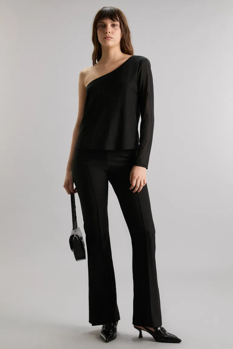 Pantalón de punto negro de corte slim y tiro medio con abertura lateral de Kosiuko en Pantalones para argentina