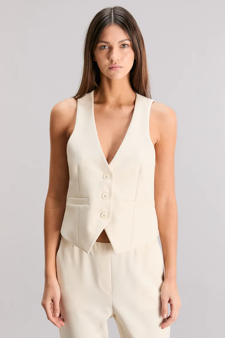 Chaleco de viscosa con estampado exclusivo y diseño slim para un look elegante y sofisticado de Kosiuko en Chalecos para argentina