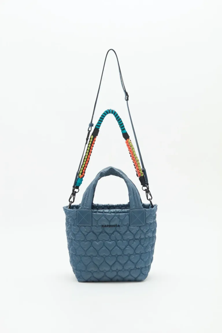 Cartera tote matelassé gris con cordones multicolor, práctica y cómoda de Rapsodia en Bolsos y Carteras para argentina
