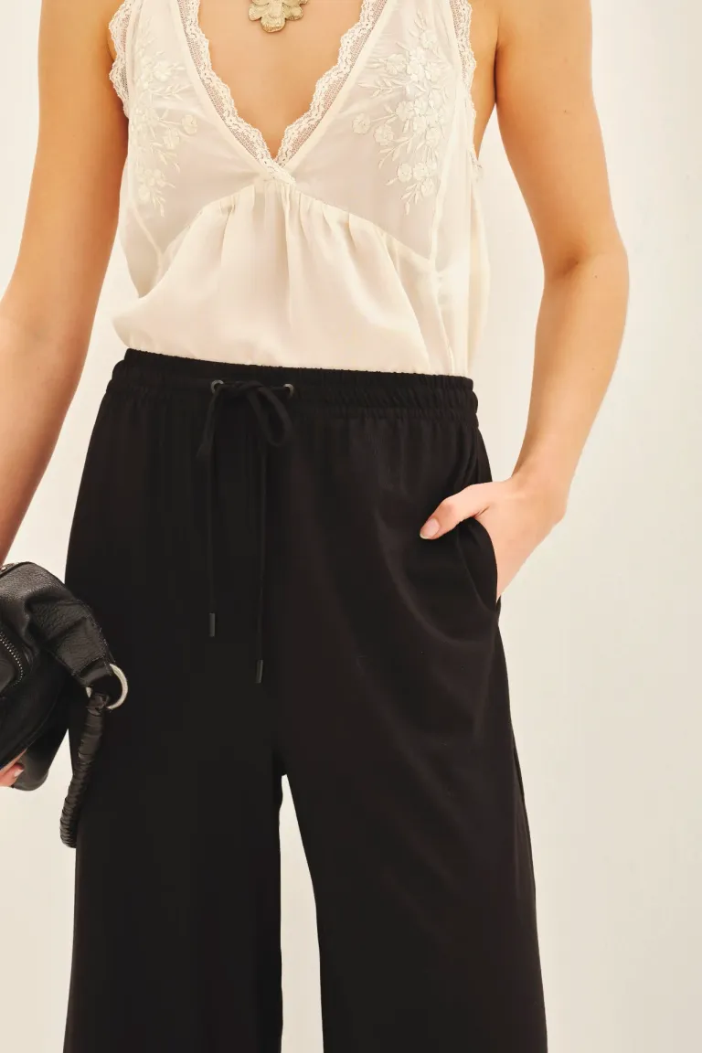 Pantalón tipo palazzo con elástico en la cintura y corte por encima de los tobillos de Rapsodia en Pantalones para argentina
