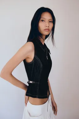 Top denim detalle metálico de Mango en Tops para argentina