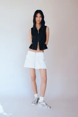 Top denim detalle metálico de Mango en Tops para argentina