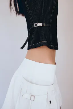 Top denim detalle metálico de Mango en Tops para argentina