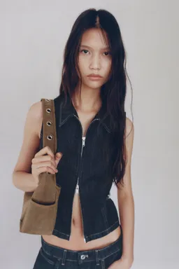 Top denim detalle metálico de Mango en Tops para argentina