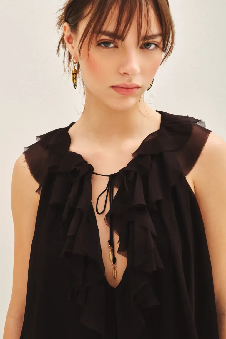 Top sin mangas con escote en V y detalles de volantes en el frente de Rapsodia en Tops para argentina