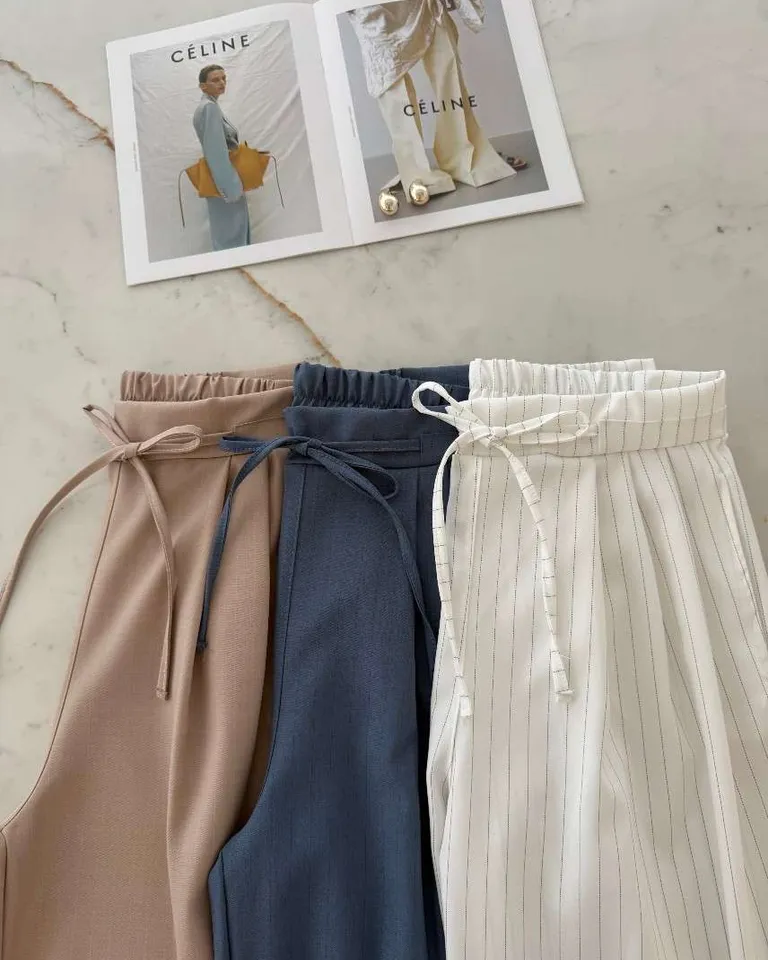 Pantalón ancho de corte recto con cintura elástica y lazos en tono beige de Hesed en Pantalones para argentina