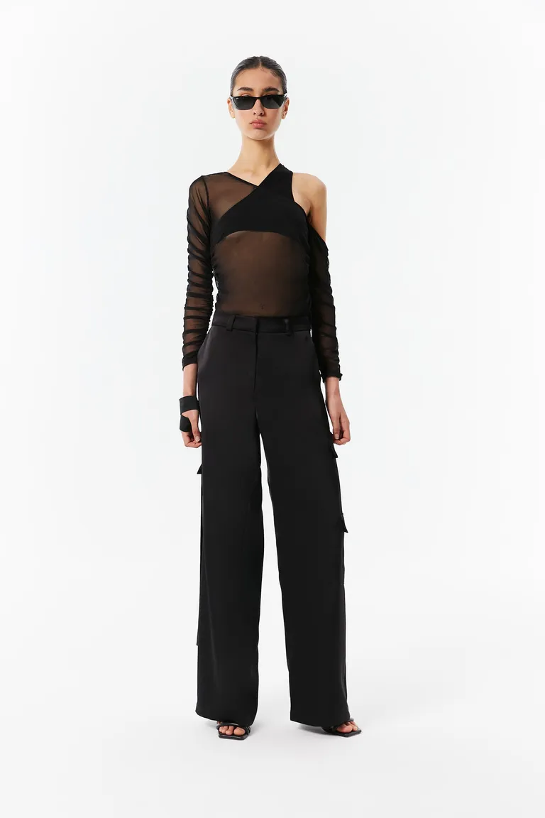 Top de diseño asimétrico en color negro para mujer de Naíma en Tops para argentina