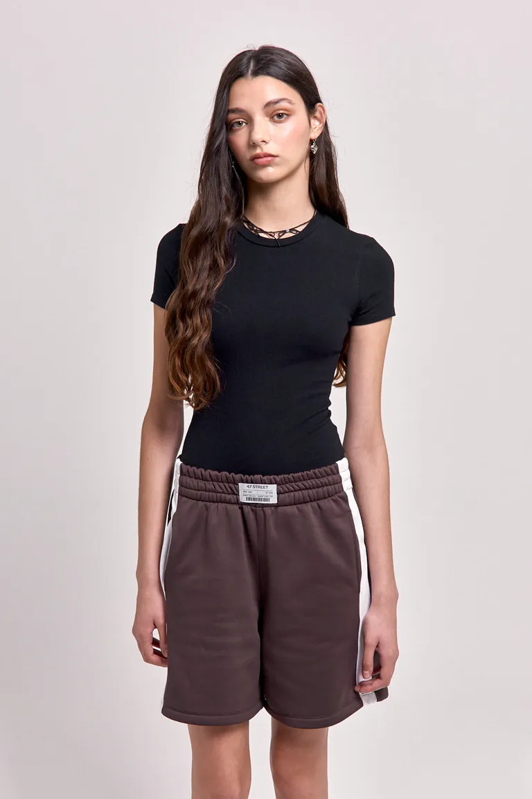 Body de mujer manga corta con cuello redondo y cierre inferior de 47 Street en Bodies para argentina