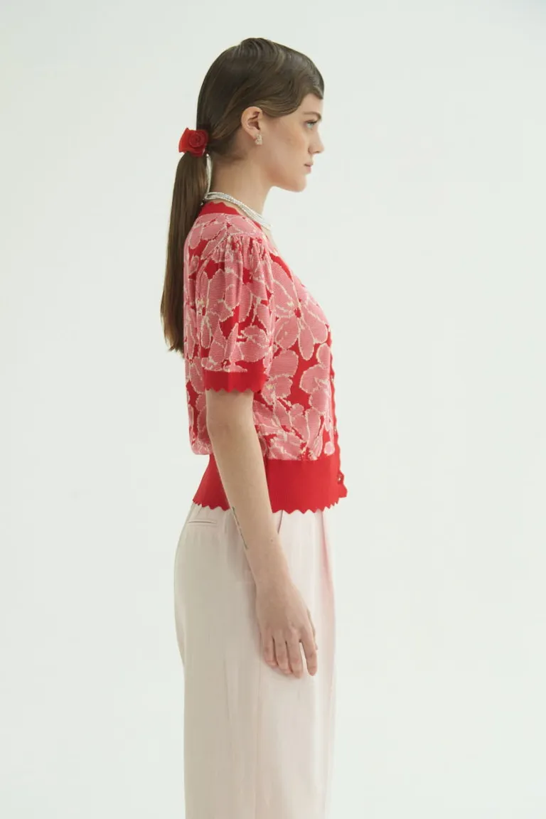 Cardigan de manga corta con diseño floral y textura suave para un estilo femenino y moderno de Las Pepas en Buzos y Sweaters para argentina